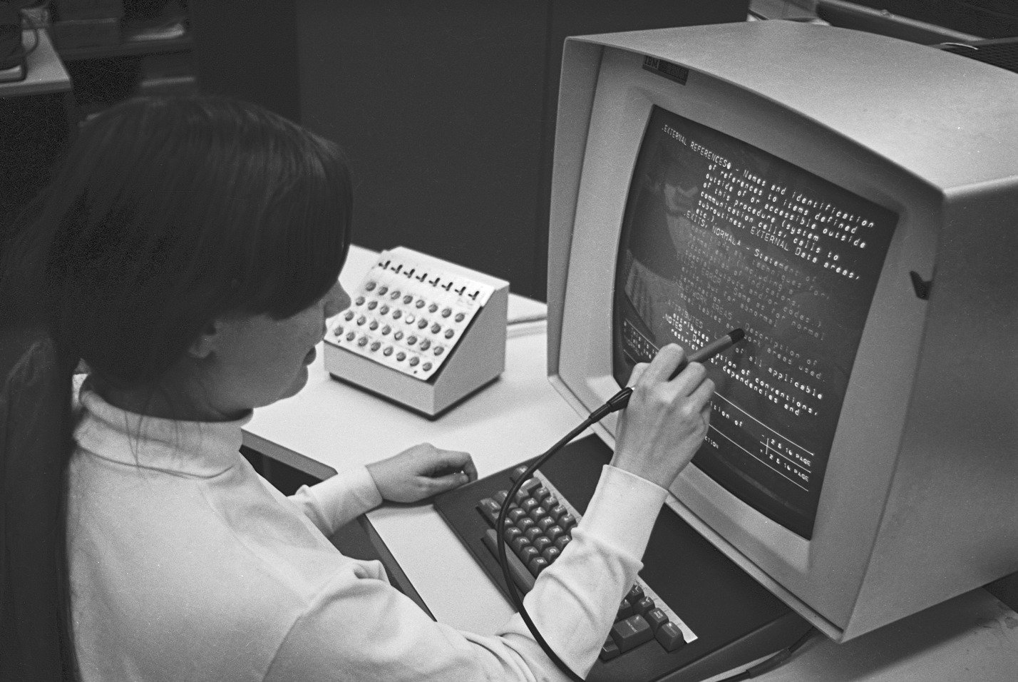 Figure 2: A computer operator using the Hypertext Editing System in 1969. (Gregory Lloyd from Wikipedia, CC BY-SA 4.0 International.)